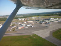  - CYQB overview fron Cessna 172 C-GLFQ just after takeoff from funway 06. Can be seen: Continental Express Embraer ERJ145, Air Transat Airbus A310-200, WestJet Boeing 737-700 ans some others private jets and prop aircrafts. - by olinadeau