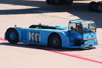  - aircraft tug at Amsterdam Schiphol Airport - by Chris Hall