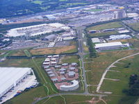  - The original Liverpool Airport at Speke, the old terminal building and apron can be seen to the left of the picture - by Chris Hall
