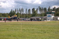  - Hultsfred airport during its air show on 20 june 2010. At the left is DC-3 9Q-CUK. - by Henk van Capelle