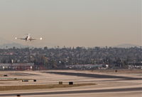  - DC-9 on short final 25L KLAX with a crosswind landing. - by Mark Kalfas