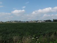  - Viewed from across the field on Airport Road.  - by Kevin Kuhn