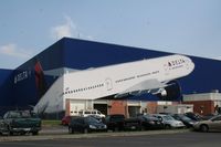  - The Northwest 747 is gone and now there is a Delta 777 painted here - by Florida Metal
