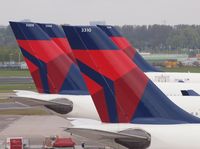  - A part of the old North West Airline fleet in the new Delta Colours. - by Willem Goebel