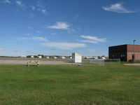  - Extensive hangars on east side of 18-36. In 1965 there were only a few year-around tiedowns east of Rwy 18-36 and 18-36 was 5,950 ft by 100 ft then. Is shorter now at 4,855 ft. by 100 ft. - by Doug Robertson