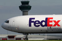  - Fed Ex MD11 passing Stansted's tower - by N-A-S