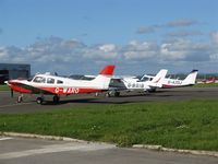  - Aircraft on the general aviation apron.  - by Roger Winser