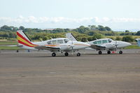  - Visiting Piper Aztecs of Giles Aviation. - by Roger Winser