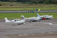  - Visiting and resident aircraft on the apron. - by Roger Winser