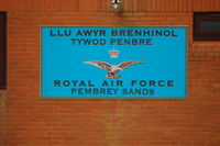  - Sign on the administration building situated on the former RAF Station Pembrey technical site. RAF Pembrey Sands Air Weapons Range (EGOP) has it's own landing grounds and has never been part of the former RAF Station Pembrey or Pembrey Airport. - by Roger Winser