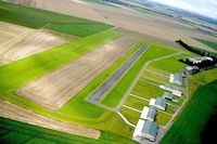  - LFPG with work being carried out on grass runway, which explains its brownish color. - by BernardDelfino
