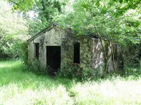  - Remains of a former RAF Fairwood Common dispersal building used by the aircrew of twin-engined aircraft in the 1940's. Located just outside the airport perimeter fence near the threshold to Runway 04. - by Roger Winser