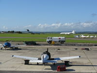  - View over the GA apron to two Ryder Cup bizjets. - by Roger Winser