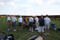  - Judging crew checking out N33708 at Airventure 2010. - by Bob Simmermon
