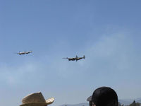  - Formation Flight-two Lockheed P-38 LIGHTNINGS N7723C in lead & N138AM at 2010 Wings Over Camarillo 30th Annual Airshow. (You are seeing about half of the World's airworthy P-38s in one photo) - by Doug Robertson