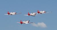  - Aeroshell Aerobatic Team departing for the National Anthem. - by Kreg Anderson