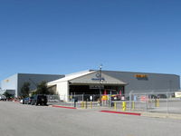  - Two new completed SUN AIR JETS expansion executive aircraft hangars with 45,000 square feet of space adjacent ORBIC Helicopters-Robinson Dealer - by Doug Robertson