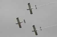  - Texan Team, three disabed pilots flying close formation in these ultra lights - taken at the Royal International Air Tattoo 2010 - by Steve Staunton