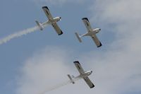  - Texan Team, three disabed pilots flying close formation in these ultra lights - taken at the Royal International Air Tattoo 2010 - by Steve Staunton