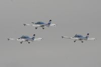  - Texan Team, three disabed pilots flying close formation in these ultra lights - taken at the Royal International Air Tattoo 2010 - by Steve Staunton