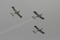  - Texan Team, three disabed pilots flying close formation in these ultra lights - taken at the Royal International Air Tattoo 2010 - by Steve Staunton