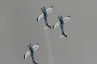  - Texan Team, three disabed pilots flying close formation in these ultra lights - taken at the Royal International Air Tattoo 2010 - by Steve Staunton