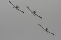  - Texan Team, three disabed pilots flying close formation in these ultra lights - taken at the Royal International Air Tattoo 2010 - by Steve Staunton