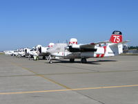  - CAL FIRE/CDF S-2T and TS-2A tankers on ramp just prior to start of 2005 fire season (last year piston TS-2As in service) - by Steve Nation