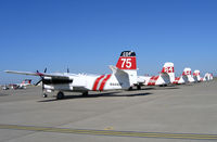  - CAL FIRE/CDF S-2T and TS-2A tankers on ramp just prior to start of 2005 fire season (last year piston TS-2As in service) - by Steve Nation