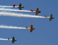  - T-6s in formation with a single BT-13 - by Florida Metal