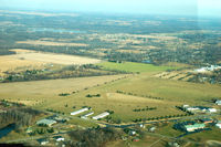  - My daughter took this photo from the backseat of our 172 as we were departing on the downwind leg back to TTF (Monroe Custer). Napoleon is a beautiful airport.... Wide long smooth runways, Great lunch at the Napoleon Cafe, a short walk from the parking ar - by 78-0001
