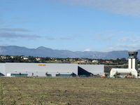  - New SUN AIR JETS FBO Expansion Hangars, CMA Tower to right, close up view. SUN AIR JETS now has 123,000 square feet of hangars and 20,000 square feet of executive terminal at CMA. - by Doug Robertson