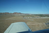  @ Boulder City Municipal Airport - Boulder City airport seen on a downwind leg - by Nick Taylor Photography