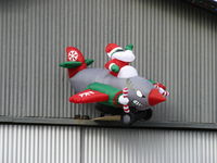  - Santa Claus' Flight Turning & Burning at 2 TAXI, (twin engine for reliability-the props are turning in the wind), closeup - by Doug Robertson