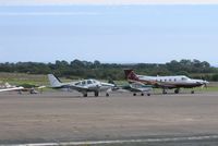  - Visiting aircraft on the apron. - by Roger Winser
