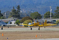  - Texans N7522U Navy F/Oakland and N6979C USAF TA-79 formation take-off @ 2010 Watsonville fly-in - by Steve Nation