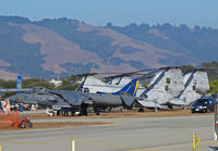  - MARINE CORPS RULES - VMA-513 AV-8B+ 165006 WF-01 boss bird; HMM-268 CH-46Es 153318 YQ-01, 156456 YQ-02 and 153368 YQ-10 (on forward mast visible); and tail of Commemorative AF AZ Wing TB-25N N125AZ #18 visible @ 2010 Watsonville fly-in - by Steve Nation