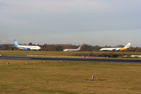  - Thomas Cook A330 lined up ready for departure as BMI Baby B737 and Monarch B767 hold - by Chris Hall