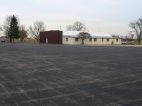  @ Miami University Airport - Ramp and corporate hanger - by Bob Simmermon