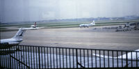 - Taken from an observation deck long ago closed to the public on top of one of the concourses. N763NC on the left of the picture. - by GatewayN727