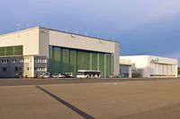  @ Saarbrücken Airport - Cirrus Airlines and Contact Air maintenance facility - by Friedrich Becker