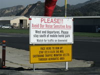  - Updated pilot aircraft departure information-warning, at Rwy 22 windsock - by Doug Robertson