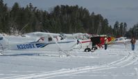  - The first few planes to arrive at the 1st Annual Zorbaz Ski-plane Chili Fly-in at Zhateau Zorbaz in Park Rapids, MN. - by Kreg Anderson