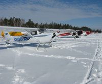  - A whole line of ski planes at the 1st Annual Zorbaz Ski-plane Chili Fly-in at Zhateau Zorbaz in Park Rapids, MN. - by Kreg Anderson