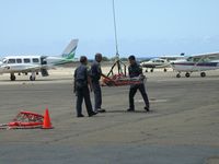  @ Kalaeloa (john Rodgers Field) Airport - Rescued Jet Pilot!-JRF ramp in front of Hangar 111. 2003 - by Ewa Marine