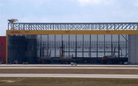  - DHL plane yard in a rare moment with wide open gates.
 - by Holger Zengler
