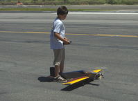  - High power runup using the ankle-chock holdback technique. Yes, that's Sammy Mason, in 2007 about 13 years old. - by Doug Robertson