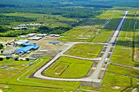  @ Johan Adolf Pengel International Airport (Zanderij Int'l) - Overview of SMJP RWY 11/29 with on the ramp a KLM MD-11, two Surinam Airways B733 in/ outside the hangar, and a few domestic airline birds on the ramp. - by anair80