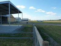  - Kyneton Aero Club Hangars and parking area looking north. The sealed strip can just be seen to the right. - by red750