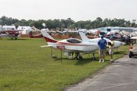  - Aircraft on display at Sun N Fun 2011.  The 3 Pietenpol's on display in the background were destroyed by a storm the next day. - by Bob Simmermon